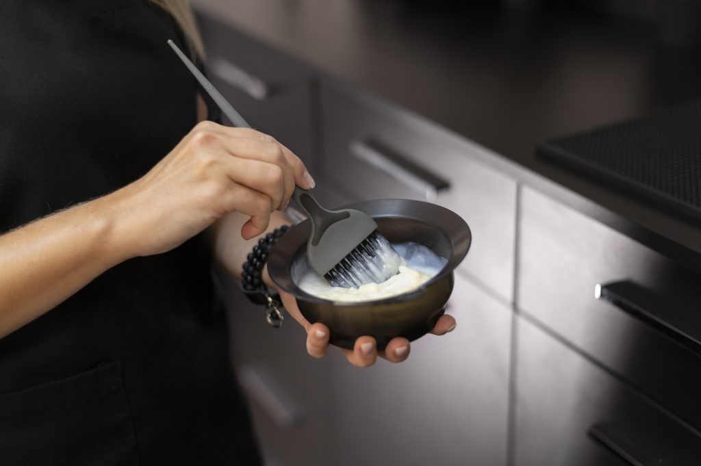 woman-mixing-hair-dye-bowl